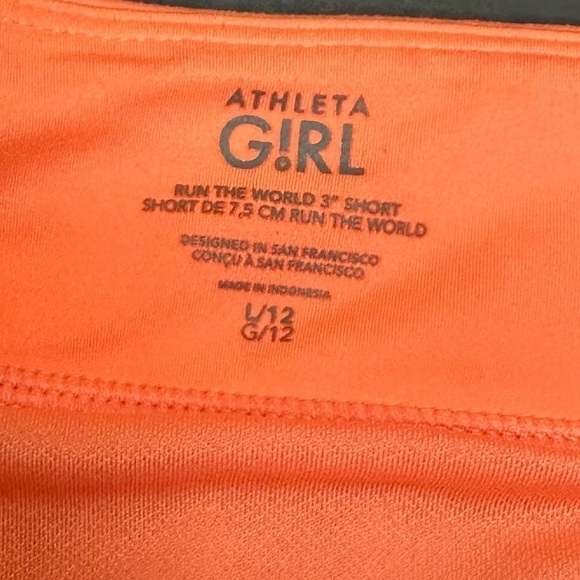 Athleta Girl Size Large 12 Run the World Short Coral Pink Blurred Floral 3” - Picture 6 of 7